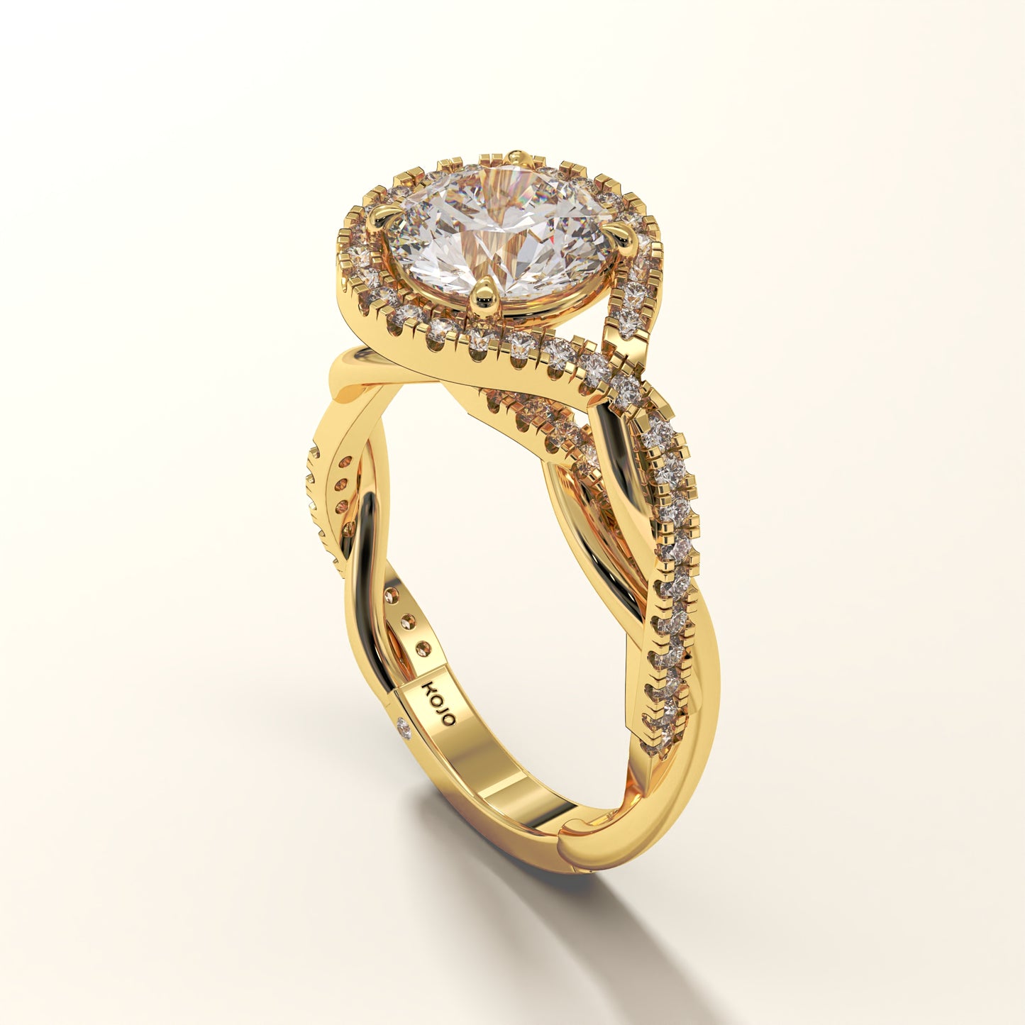 A 2 Carat Yellow Gold Round-Cut Diamond Ring with a Halo and twisted shank with accent stones.