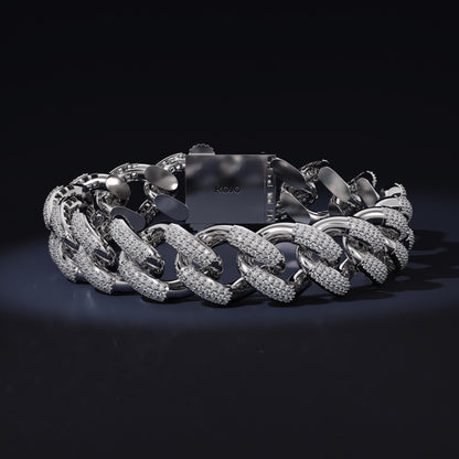 Silver chain bracelet on a black background with 'Kool' branding.