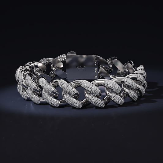 Silver chain bracelet on a black background with 'Kool' branding.