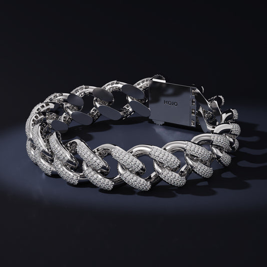Cuban Silver chain bracelet with diamond accents on a dark background