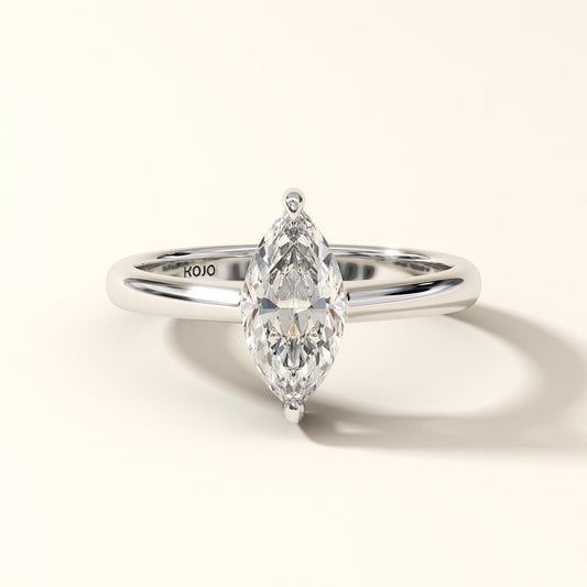Marquise-cut lab-grown solitaire diamond engagement ring with six-prong setting in 18K white gold.