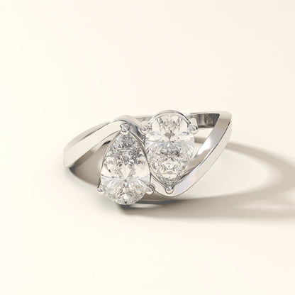 Twin Gleam 3 Carat Pear Cut Diamond Ring from KOJO Diamonds on a light beige background.