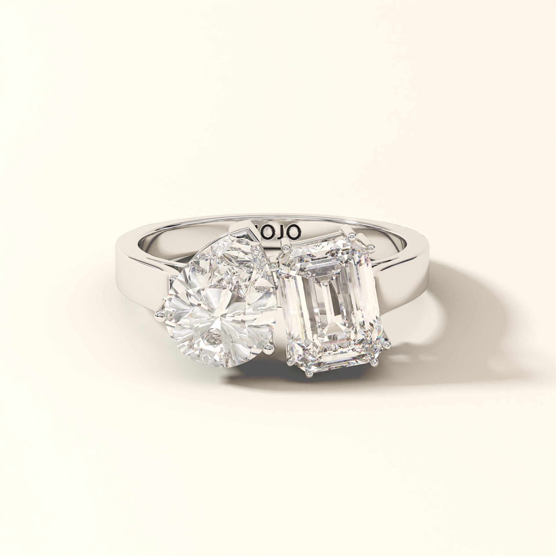 Duet Line 3 Carat Emerald-cut diamond and Pear-cut Lab-Grown Diamond Ring in 18K White Gold with 'KOJO' branding on a light background.
