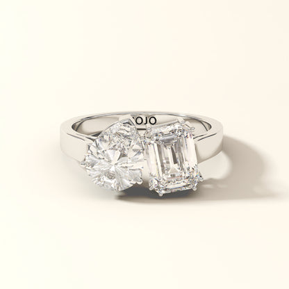 Duet Line 3 Carat Emerald-cut diamond and Pear-cut Lab-Grown Diamond Ring in 18K White Gold with 'KOJO' branding on a light background.