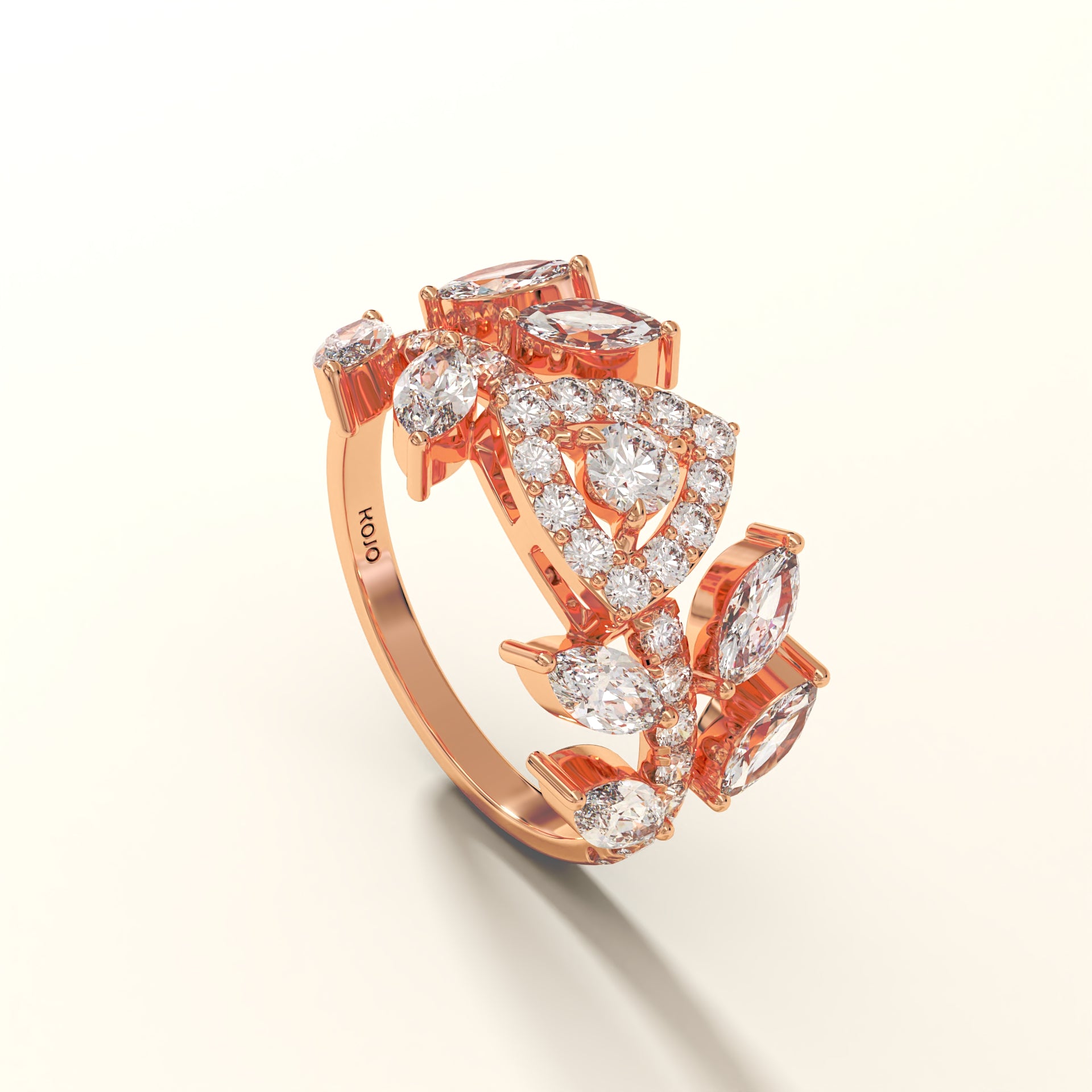 Rose gold ring with diamond accents on a light beige background