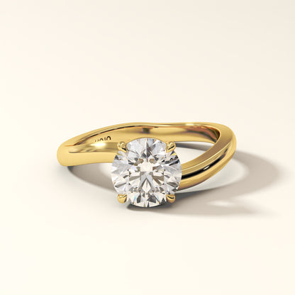 1.50 Carat Round Brilliant Diamond Ring in Yellow gold with "KOJO" Diamonds branding on a light background (front view). Solara Arc Lab-Grown Round Diamond Ring.