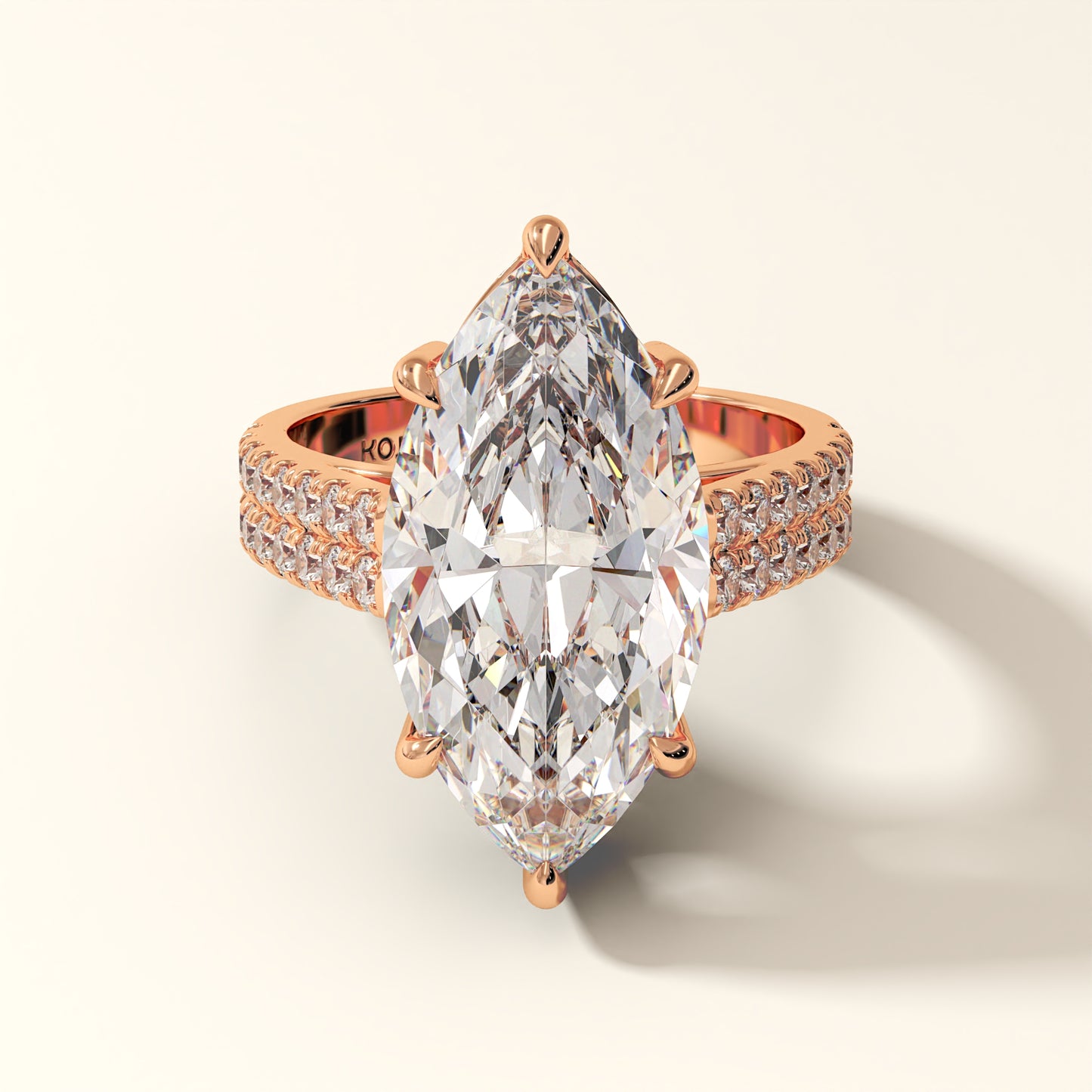 Rose gold ring with a large Eclipsera 7.94 carat marquise-cut diamond.