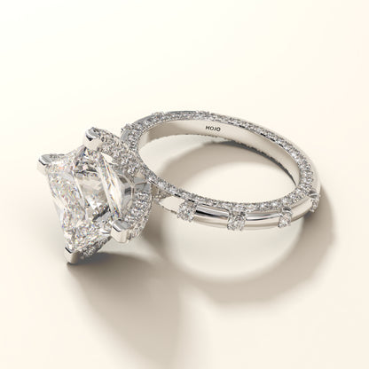 Princess-cut with round brilliant lab grown diamond ring in white gold on a light background