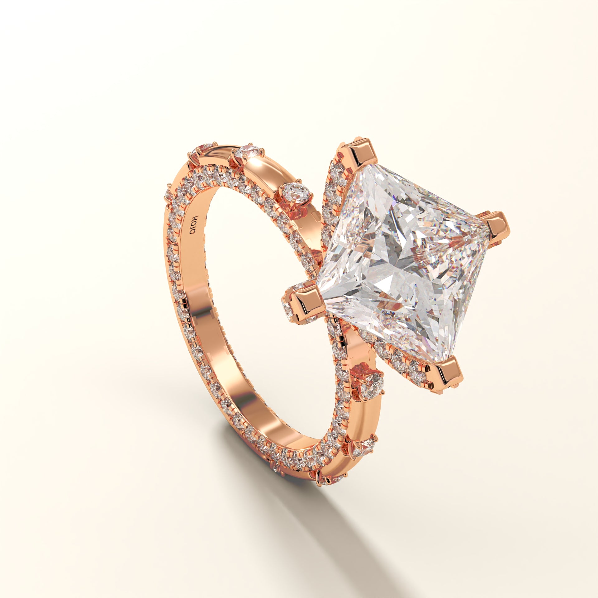 A Princess-cut lab grown diamond ring in 18kt Rose gold on a light yellow background