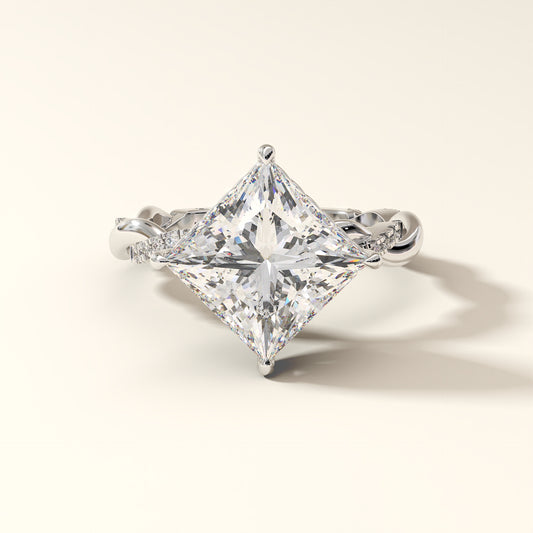 A 5.10ct radiant princess-cut lab-grown diamond ring with a braided shank in white gold.