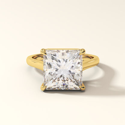 princess-cut diamond ring in yellow gold showing floating solitaire setting.