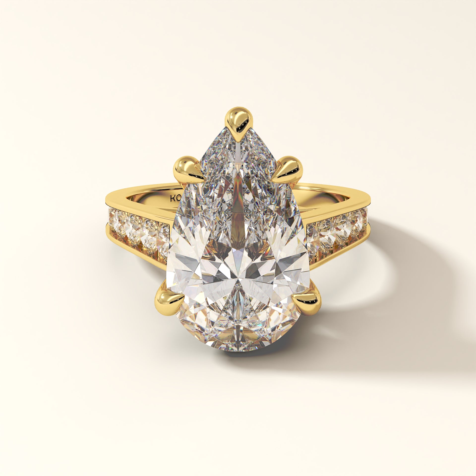 Celestial Verge pear cut lab grown diamond engagement ring with pave band in yellow gold