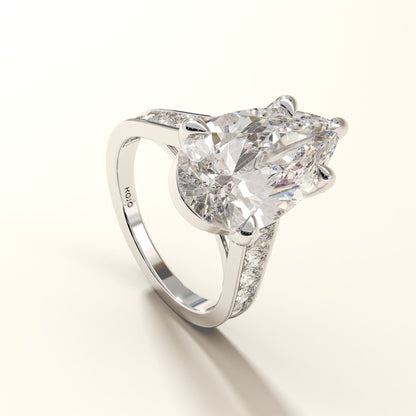 Celestial Verge side view of pear cut lab grown diamond ring with pave band in white gold