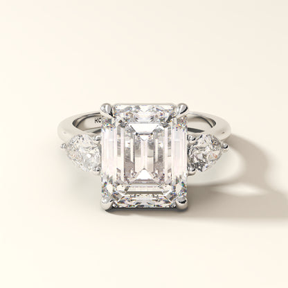 Celestine Verge emerald cut lab grown diamond three stone ring with pear side stones