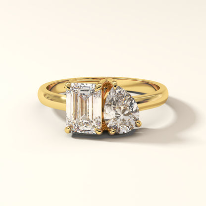 Ecliptica bond yellow gold diamond ring with pear and emerald cut diamonds of 2 carat